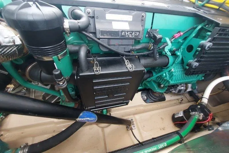 Slide: The Image of Engine compartment of a 2018 Cutwater C-30 CB boat, showcasing mechanical components. - 71