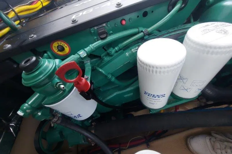 Slide: The Image of Engine components of a 2018 Cutwater C-30 CB boat, featuring Volvo filters. - 74