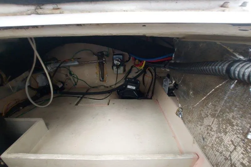 Slide: The Image of 2018 Cutwater C-30 CB engine compartment with wiring and mechanical components. - 75