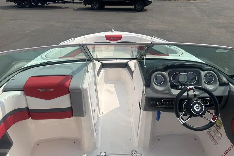 Slide: The Image of 2015 Chaparral Vortex 203 VR boat interior with steering wheel and dashboard. - 14