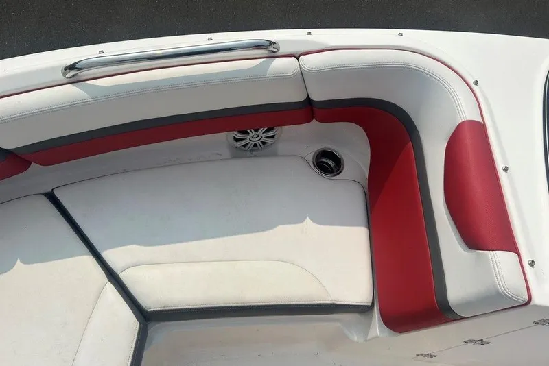 Slide: The Image of Red and white seating on 2015 Chaparral Vortex 203 VR boat interior. - 18