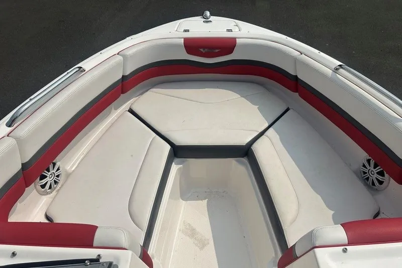 Slide: The Image of 2015 Chaparral Vortex 203 VR boat interior with red and gray seating. - 19