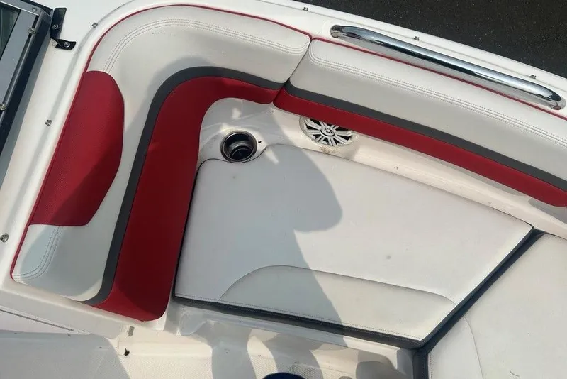 Slide: The Image of 2015 Chaparral Vortex 203 VR boat interior with red and white seating. - 20