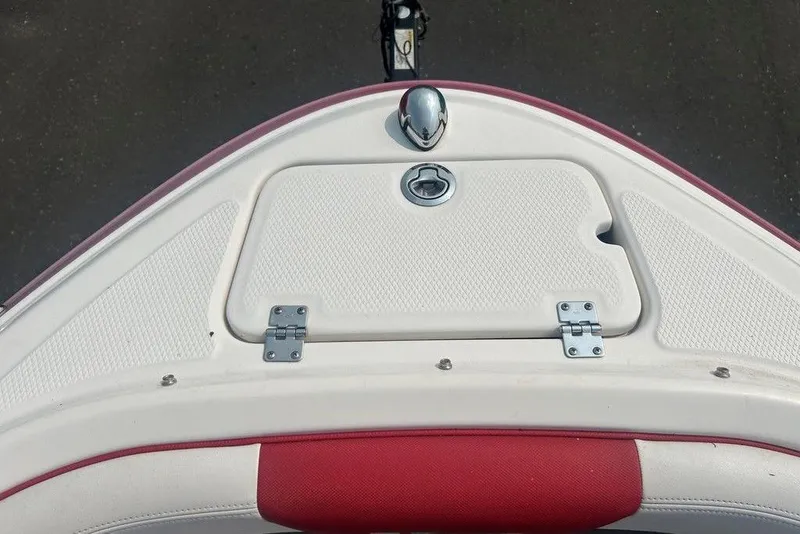 Slide: The Image of 2015 Chaparral Vortex 203 VR boat bow with red and white seating. - 21