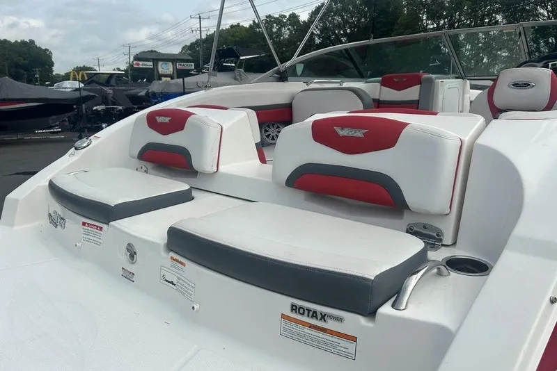 Slide: The Image of 2015 Chaparral Vortex 203 VR boat interior with red and white seating. - 6