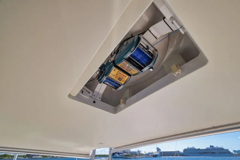Slide: The Image of Ceiling-mounted equipment on 2010 Viking 82 Convertible yacht, featuring a blue cable reel. - 37