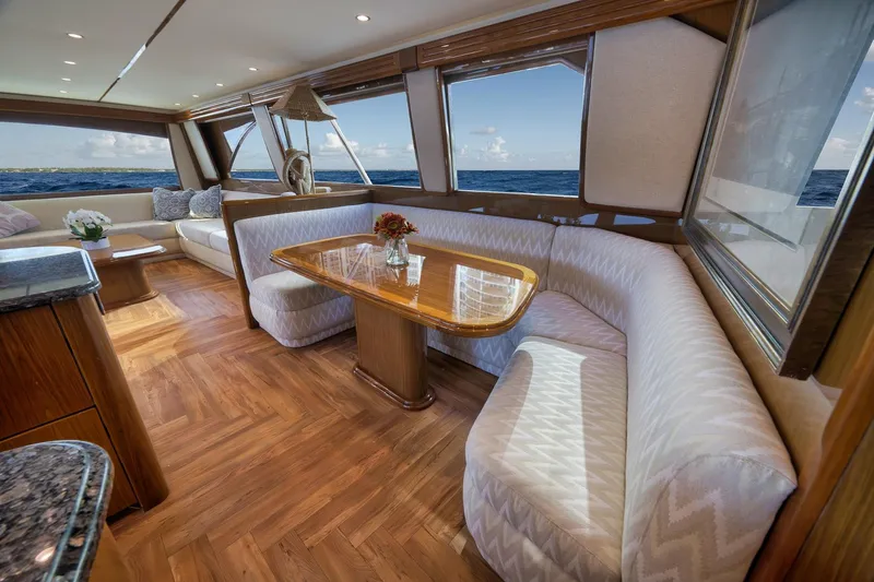 Slide: The Image of Luxurious interior of 2010 Viking 82 Convertible yacht with elegant seating and ocean view. - 42
