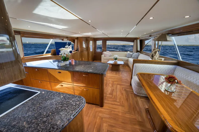 Slide: The Image of Luxurious interior of 2010 Viking 82 Convertible yacht with elegant wood finishes and ocean view. - 46