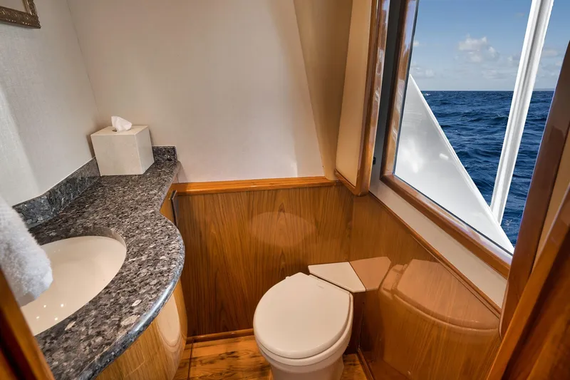 Slide: The Image of Luxurious bathroom on 2010 Viking 82 Convertible yacht with ocean view. - 48