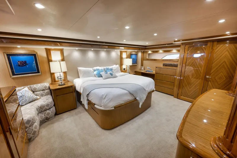 Slide: The Image of Luxurious bedroom interior of 2010 Viking 82 Convertible yacht with elegant wood finishes. - 51