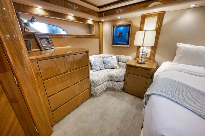 Slide: The Image of Luxurious interior of 2010 Viking 82 Convertible yacht with elegant wood finishes. - 52