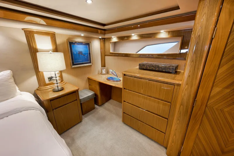 Slide: The Image of Luxurious cabin interior of 2010 Viking 82 Convertible yacht with elegant wood finish. - 54