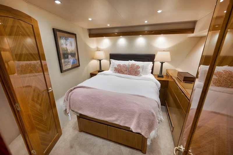 Slide: The Image of Luxurious bedroom interior on 2010 Viking 82 Convertible yacht with elegant decor and soft lighting. - 59