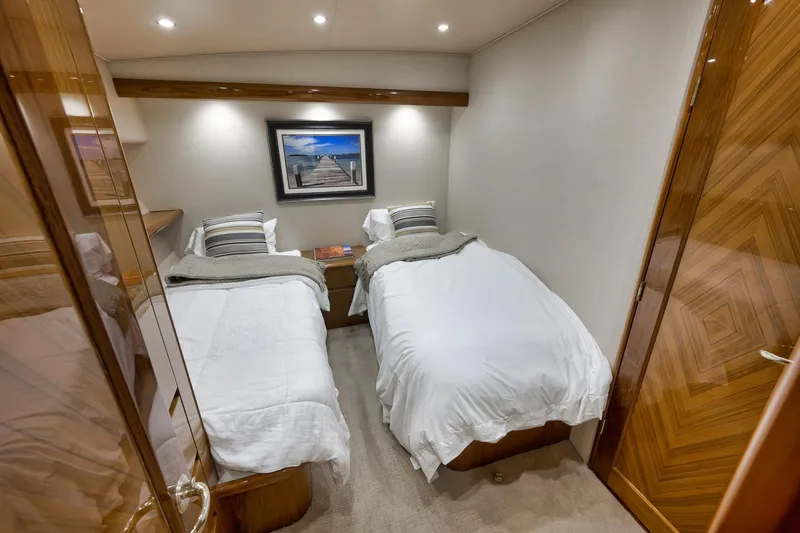 Slide: The Image of Luxurious twin bedroom in 2010 Viking 82 Convertible yacht with elegant decor. - 63