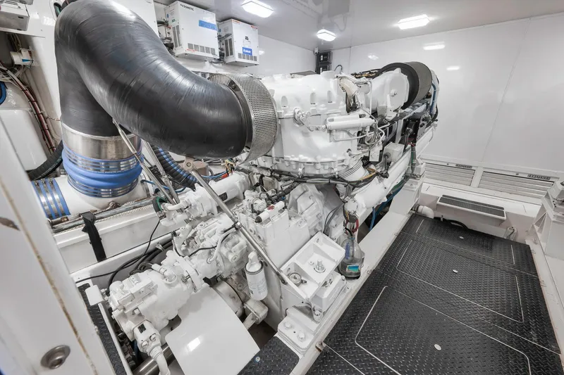 Slide: The Image of Engine room of 2010 Viking 82 Convertible yacht, showcasing advanced machinery and components. - 69