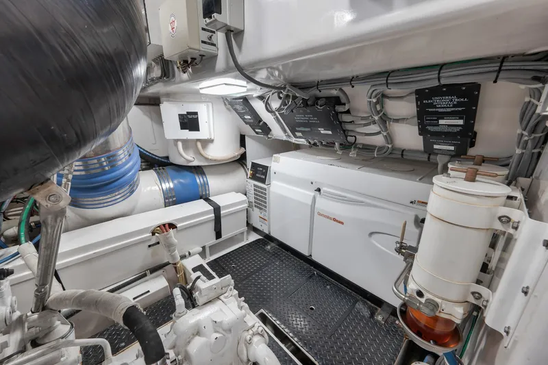 Slide: The Image of Engine room of 2010 Viking 82 Convertible yacht with mechanical equipment and wiring. - 70