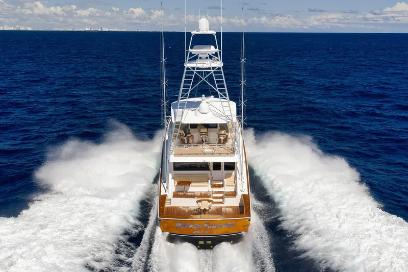 Slide: The Image of 2010 Viking 82 Convertible yacht cruising on open ocean waters. - 8