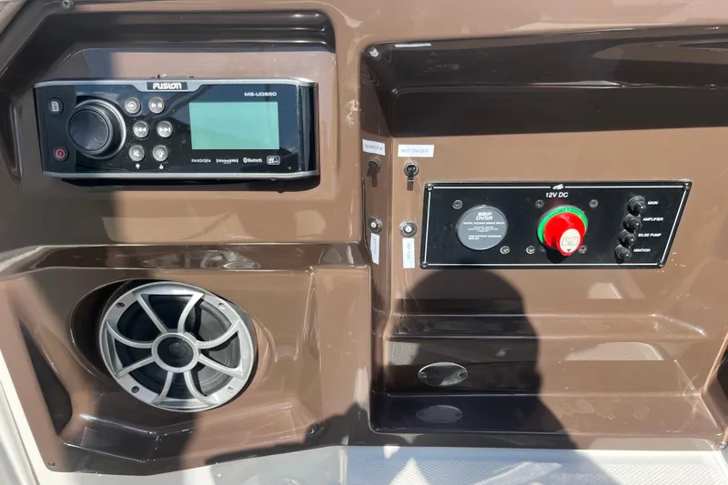 Slide: The Image of Control panel of a 2015 Monterey 268 SSC boat with audio system and speaker. - 11