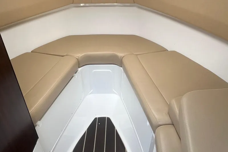 Slide: The Image of Interior cabin of 2015 Monterey 268 SSC boat with beige seating. - 15