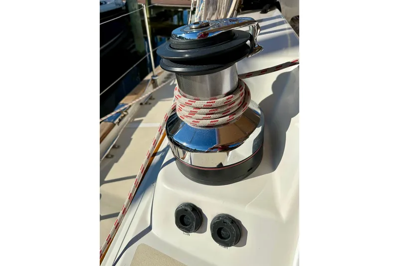 Slide: The Image of Sailboat winch with rope on 2006 Passport 470 deck. - 48