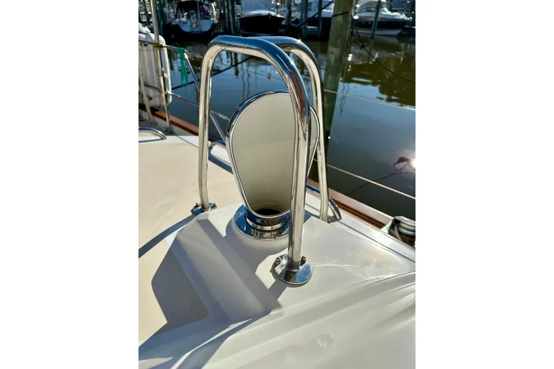 Slide: The Image of Stainless steel boat fitting on a 2006 Passport 470 yacht deck. - 49