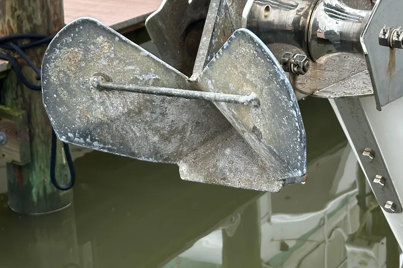 Slide: The Image of Close-up of a weathered boat anchor on a Passport 470, 2006 model. - 52