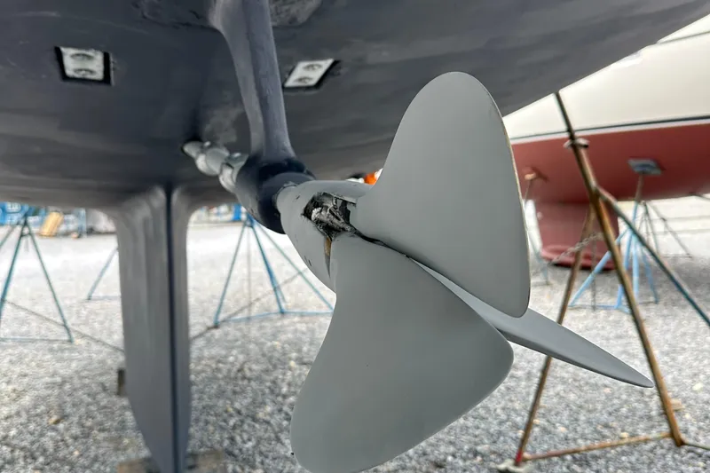 Slide: The Image of Damaged propeller of a 2006 Passport 470 sailboat in a boatyard. - 71