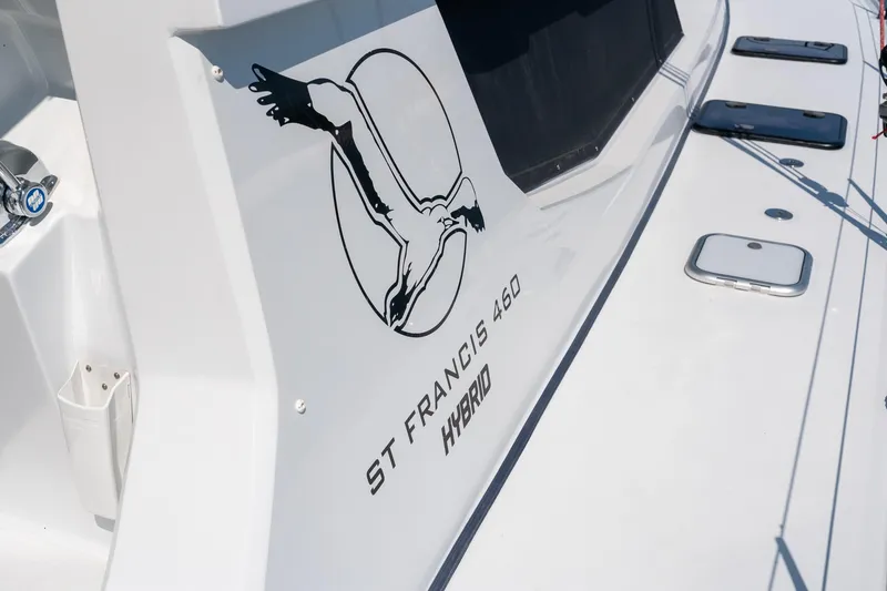 Slide: The Image of 2024 St Francis 460 Hybrid yacht with logo on white exterior. - 10
