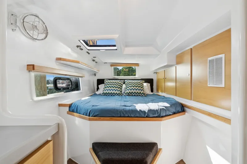 Slide: The Image of Luxurious cabin interior of 2024 St Francis 460 yacht with cozy bed and modern design. - 101