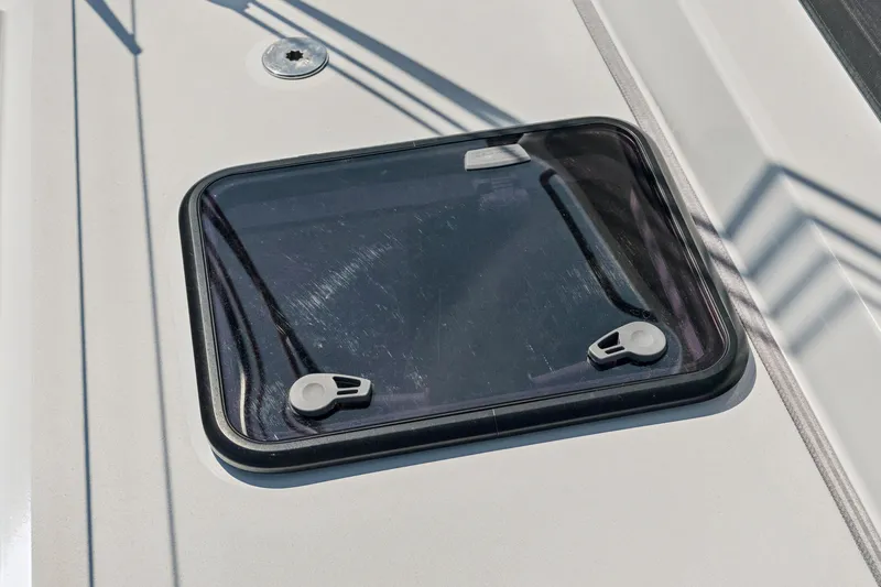 Slide: The Image of Hatch window on 2024 St Francis 460 yacht deck, featuring sleek design and secure latches. - 118