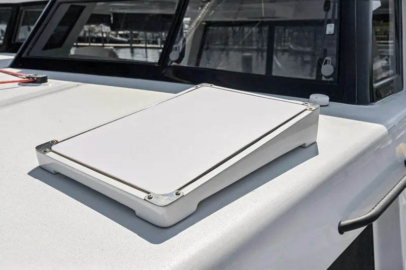 Slide: The Image of Rooftop detail of 2024 St Francis 460 boat, featuring a sleek white panel. - 125