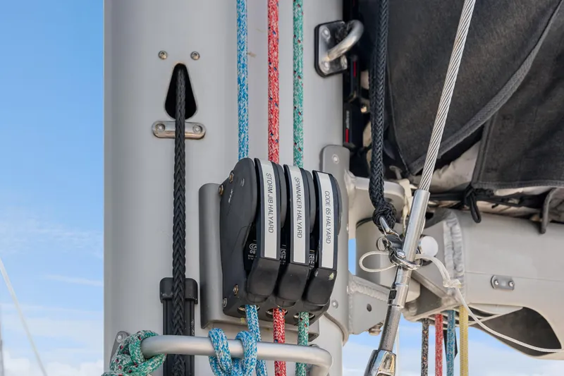 Slide: The Image of Close-up of 2024 St Francis 460 sailboat rigging and halyard system. - 129