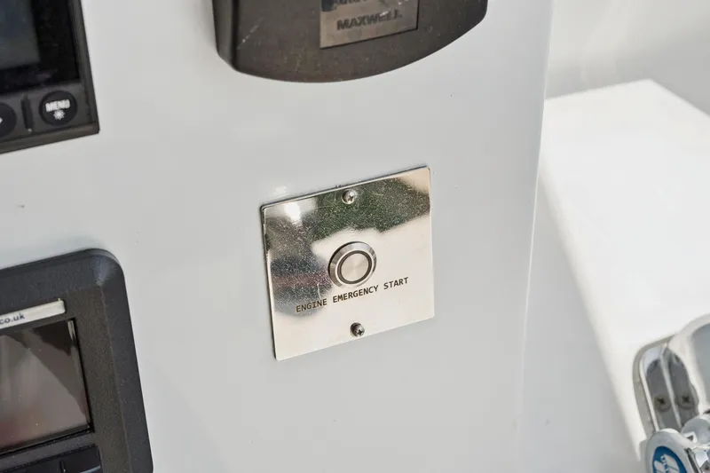 Slide: The Image of 2024 St Francis 460 engine emergency start button on control panel. - 138