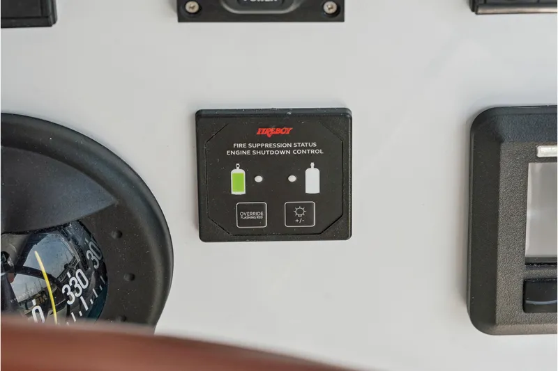 Slide: The Image of Control panel of 2024 St Francis 460 with fire suppression status indicator. - 140