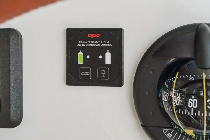 Slide: The Image of Fire suppression control panel on 2024 St Francis 460 yacht dashboard. - 142