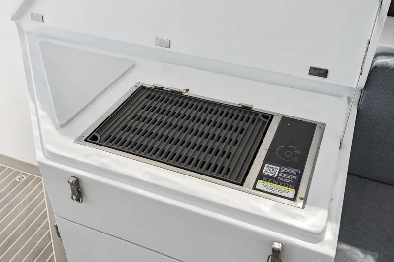 Slide: The Image of Built-in grill on 2024 St Francis 460 yacht, featuring Kenyon cooking system. - 148