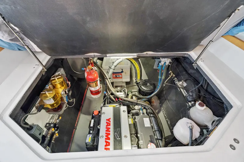 Slide: The Image of Engine compartment of 2024 St Francis 460 yacht with Yanmar engine and safety equipment. - 150
