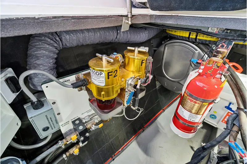 Slide: The Image of Engine room of 2024 St Francis 460 with fuel filters and fire extinguisher. - 151