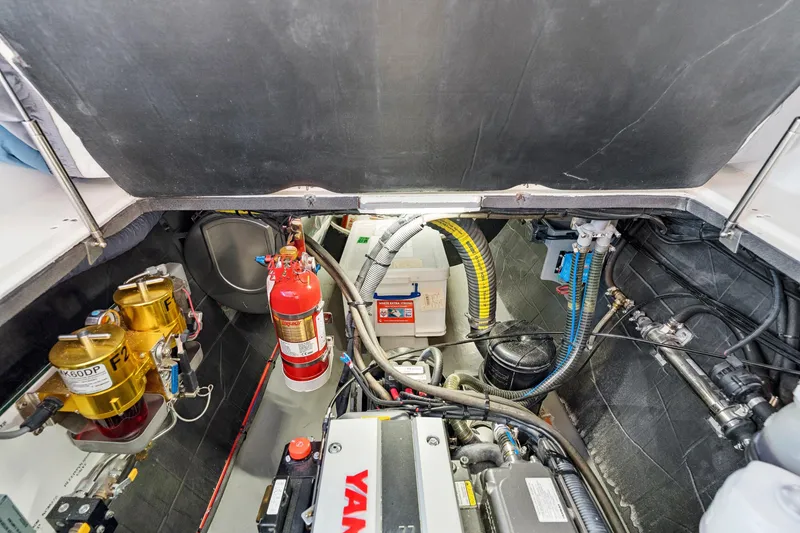 Slide: The Image of Engine room of 2024 St Francis 460 yacht with Yanmar engine and safety equipment. - 152