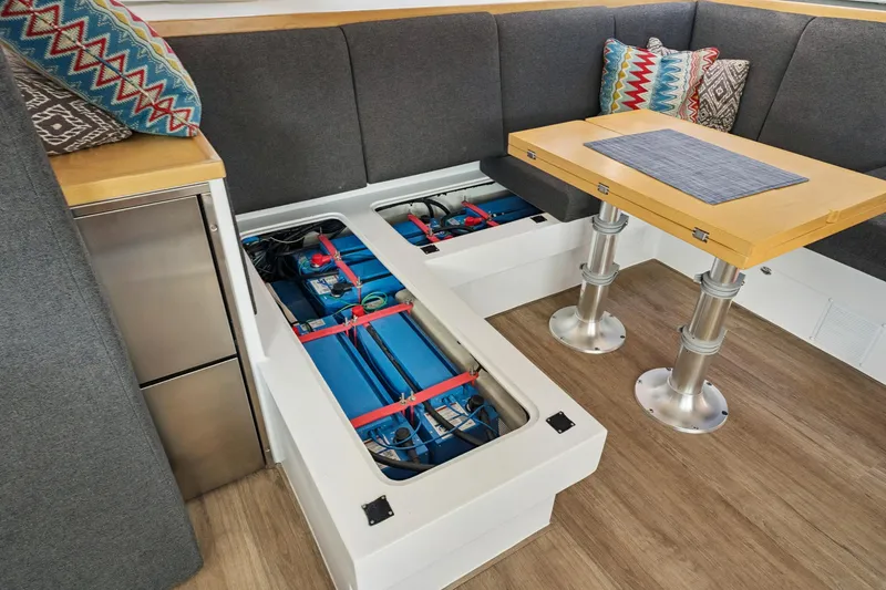 Slide: The Image of 2024 St Francis 460 yacht interior with battery storage under seating area. - 156
