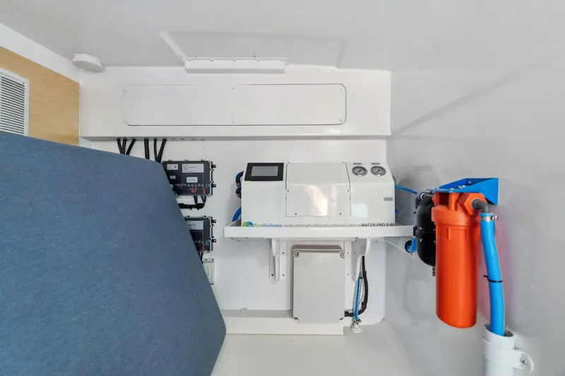 Slide: The Image of Interior of 2024 St Francis 460 yacht showing water filtration system and control panels. - 163
