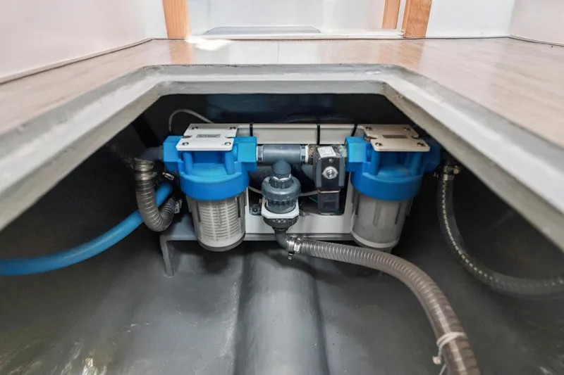 Slide: The Image of Water filtration system in 2024 St Francis 460 yacht, featuring blue and gray components. - 165