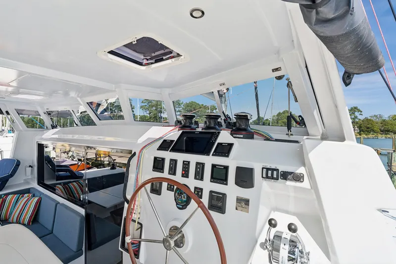Slide: The Image of 2024 St Francis 460 yacht cockpit with modern navigation controls and seating. - 36