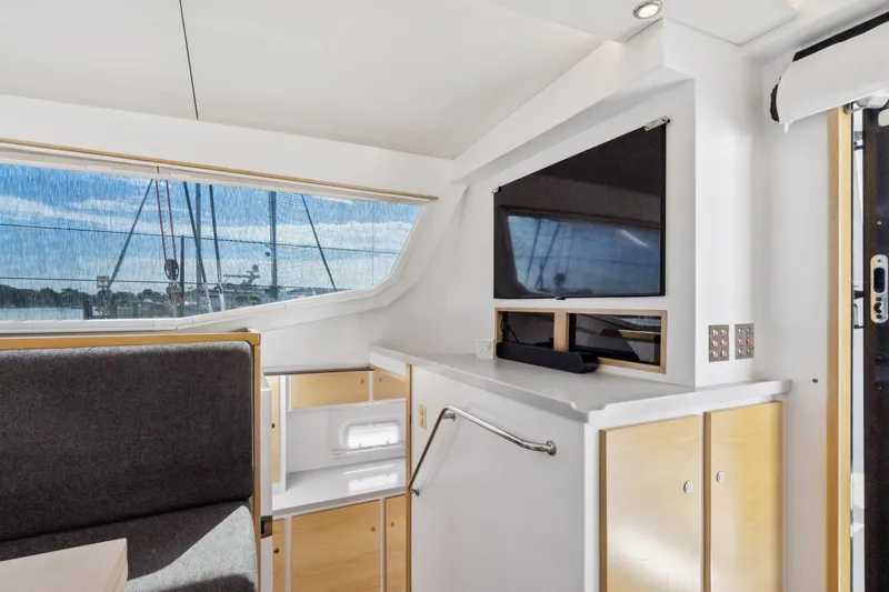 Slide: The Image of 2024 St Francis 460 yacht interior with modern design, large window, and sleek cabinetry. - 47