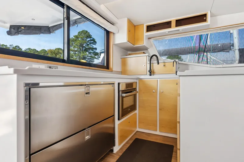 Slide: The Image of Modern kitchen interior of 2024 St Francis 460 yacht with stainless steel appliances. - 49