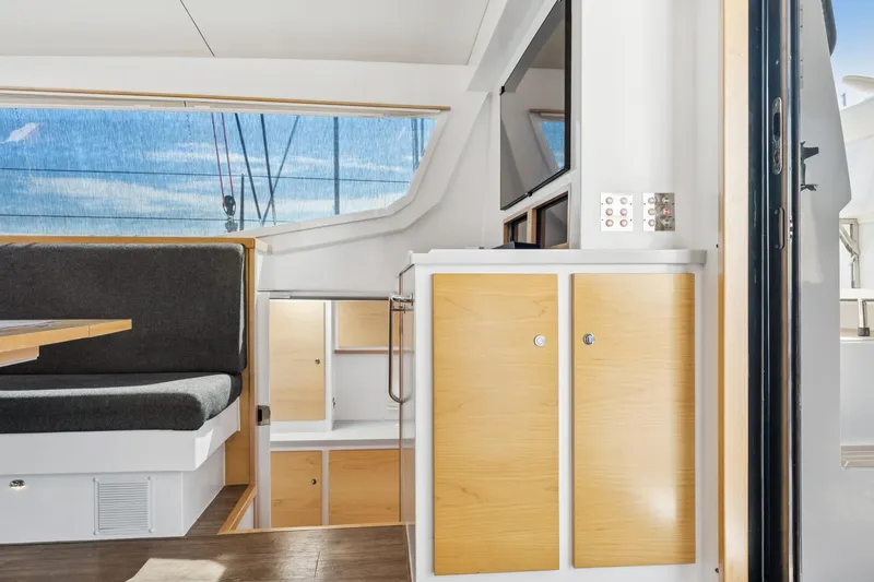 Slide: The Image of Modern interior of 2024 St Francis 460 yacht with sleek wood cabinetry and seating. - 52