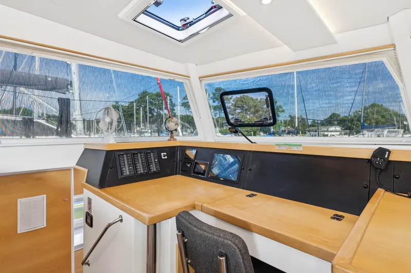 Slide: The Image of Modern interior of 2024 St Francis 460 yacht with navigation station and panoramic windows. - 53
