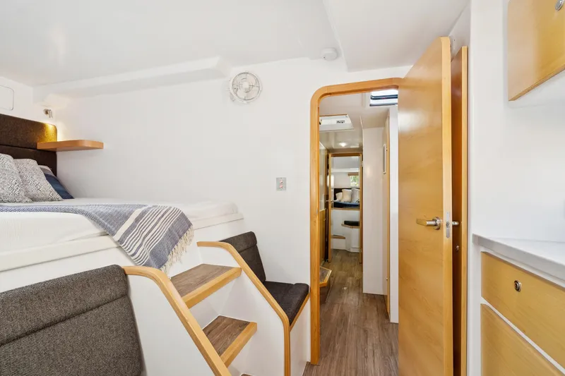 Slide: The Image of 2024 St Francis 460 interior with cozy bed, wooden steps, and modern design. - 74