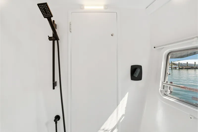 Slide: The Image of Modern shower area in 2024 St Francis 460 yacht with window view. - 79