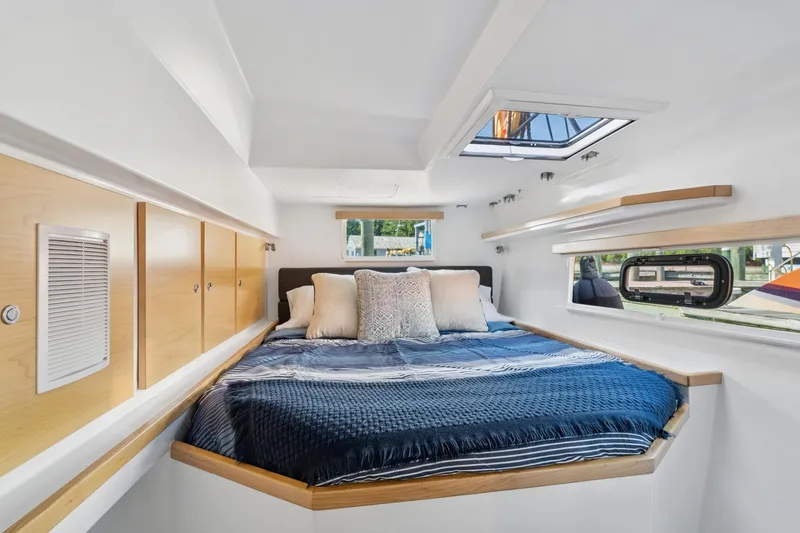 Slide: The Image of Luxurious cabin interior of 2024 St Francis 460 yacht with cozy bedding and modern design. - 90